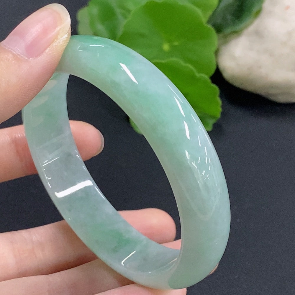 HKHQ jadeite round bangle with a 57mm size, weighing approximately 51.9g, featuring smooth, polished jade surface.