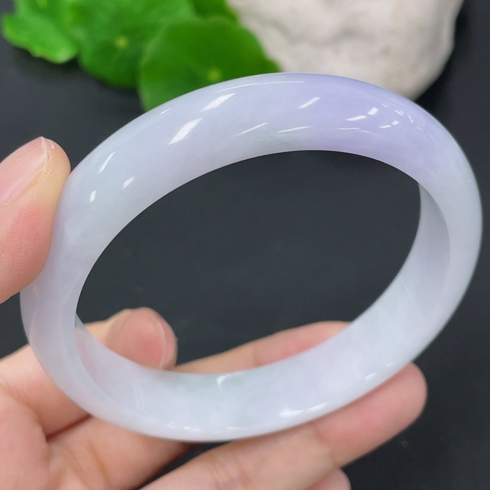 Jadeite round bangle with a 58mm diameter, weighing approximately 48.73g, crafted by HKHQ, showcasing smooth, polished jade.