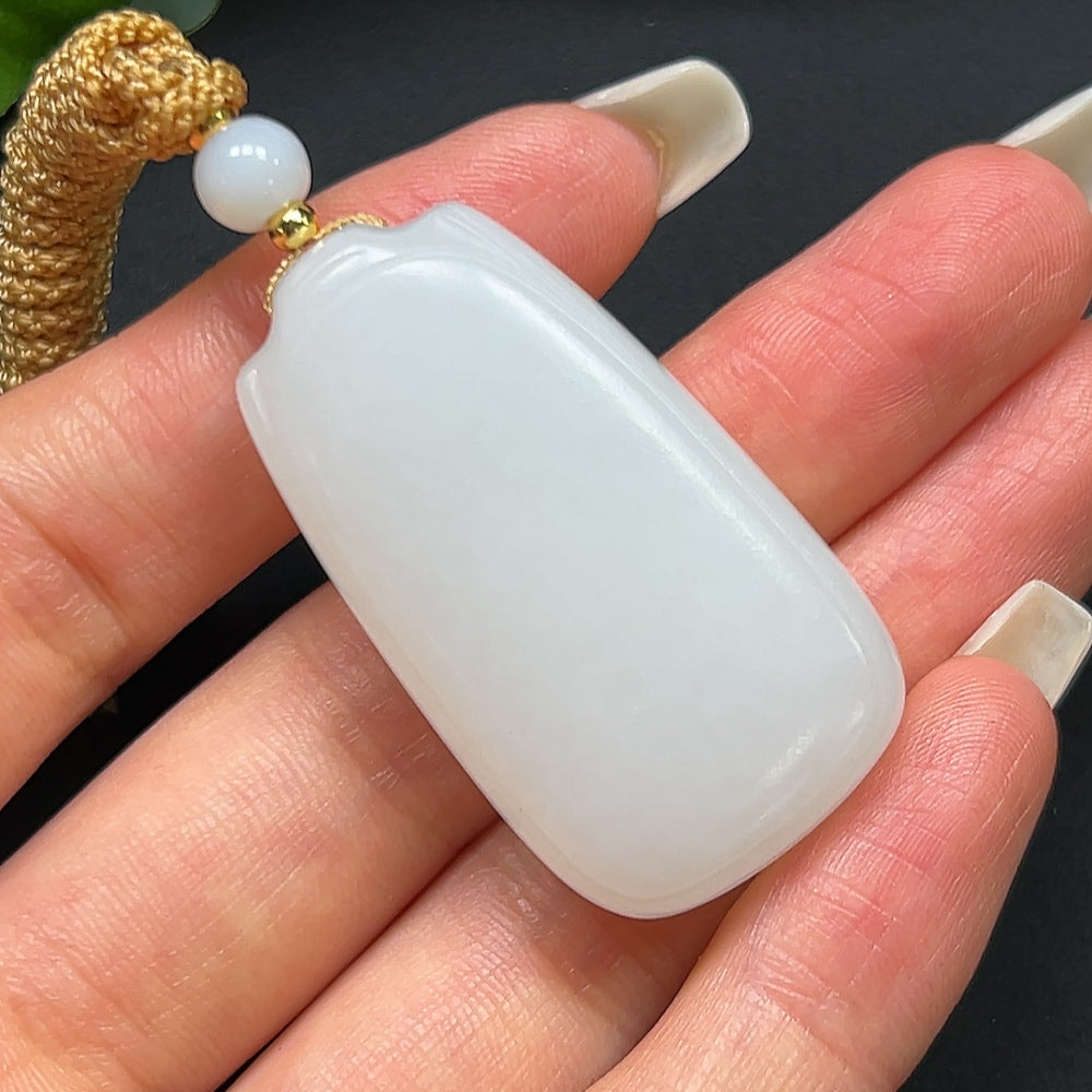 HKHQ Hetian Jade plain pendant with rope, approximately 27.31g, showcasing smooth, polished jade in a simple, elegant design