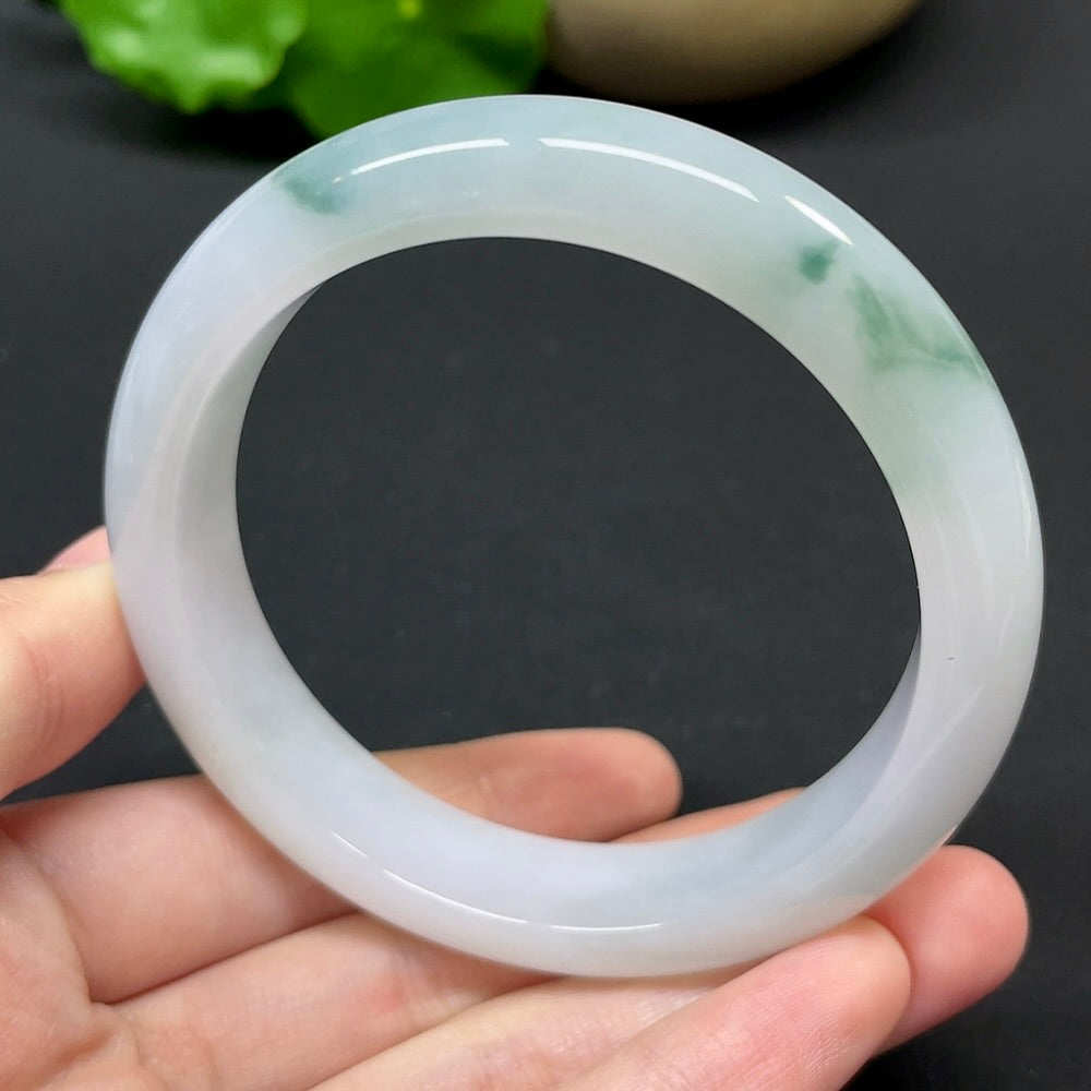 HKHQ jadeite round bangle, size 57.1, weighing 56.21g, showcasing smooth, polished jadeite with a glossy finish.