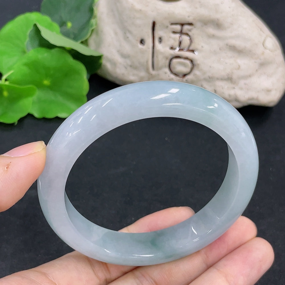 Jadeite round bracelet with approximate weight of 63.2g and size 58.3, featuring smooth jadeite beads on a HKHQ jade jewelry piece.