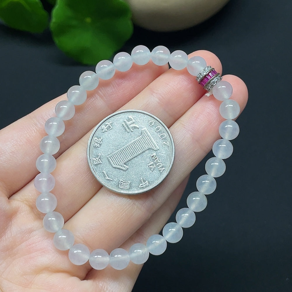 HKHQ jadeite bracelet with non-gold beads, total weight 10.66g, bead size 5.8mm, showcasing smooth jade beads.