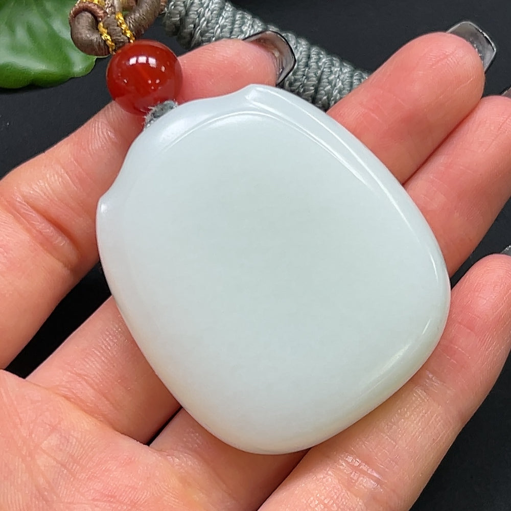 HKHQ Hetian Jade plain pendant with rope necklace, weighs 61.16g, showcasing smooth jade and elegant design.
