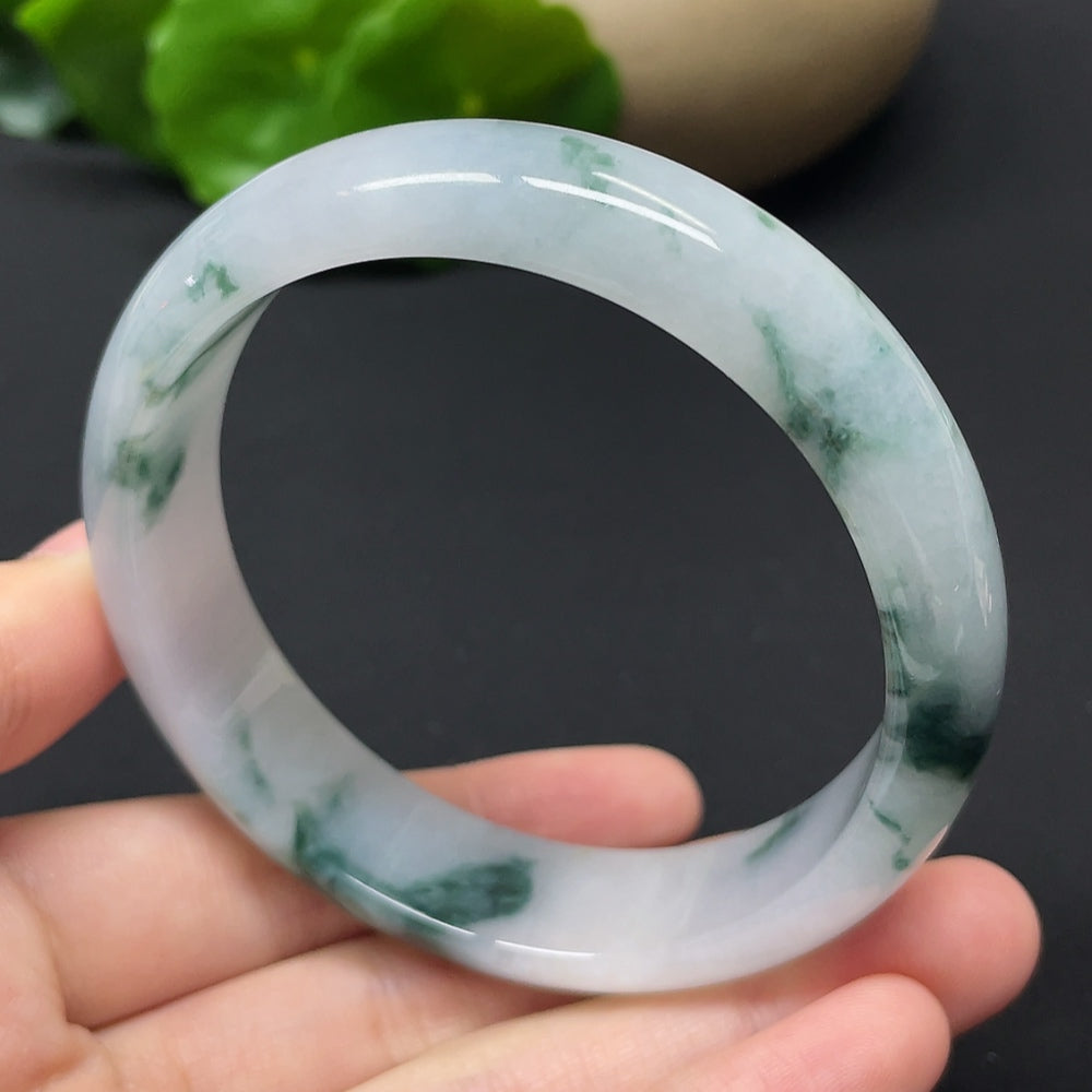 HKHQ jadeite round bangle with mineral components, weighs 54.31g, size 57.9, showcasing smooth, polished jadeite surface.
