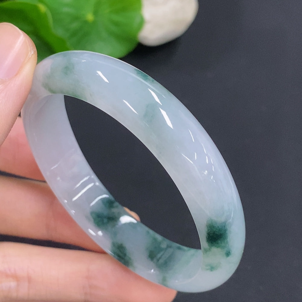 Jadeite concubine bracelet from HKHQ, size 55.5/47.5, featuring smooth green jade stones with a total weight of 38g.