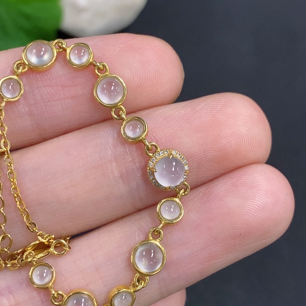 HKHQ jadeite cabochon inlay bracelet with 18k gold and diamond accents, showcasing the elegant jewelry design.