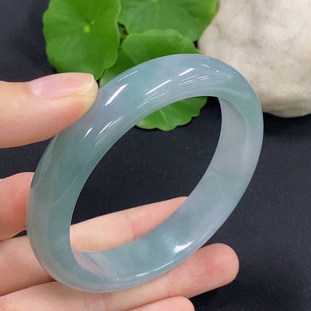 HKHQ jadeite round bangle, size 56.8, weighs 56.55g, showcasing smooth, polished jadeite bracelet with a glossy finish.