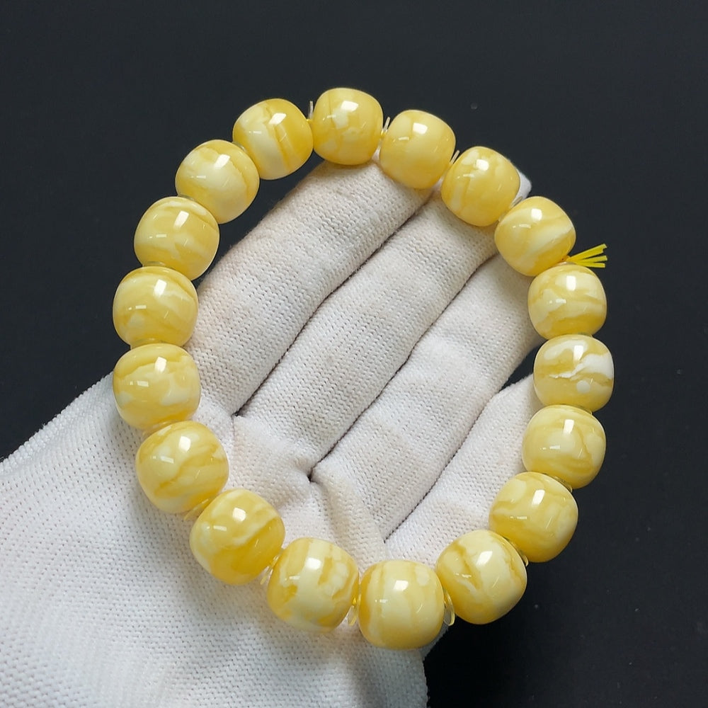 Amber Beeswax Bracelet by HKHQ, 24.6g, featuring warm amber beads and natural beeswax accents on a sturdy bracelet band.