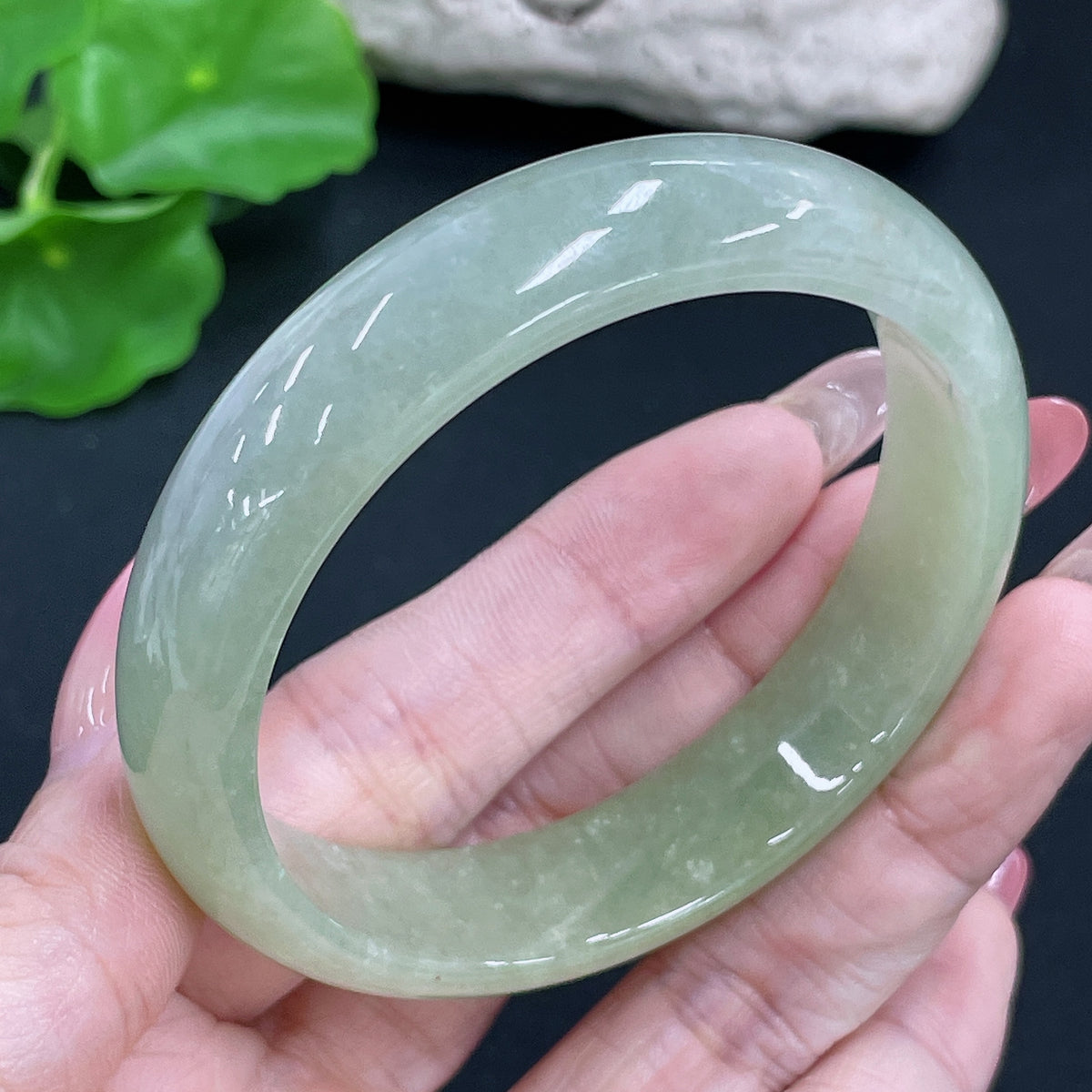 Jadeite round bracelet by HKHQ featuring smooth jade beads, weight approximately 51.42g, size 56.8mm, natural green hue.