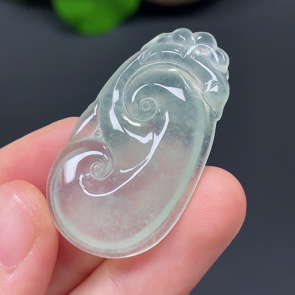 Jadeite Ruyi pendant with intricate carving, weighing approximately 7.36g, from HKHQ featuring smooth, polished jade stone.