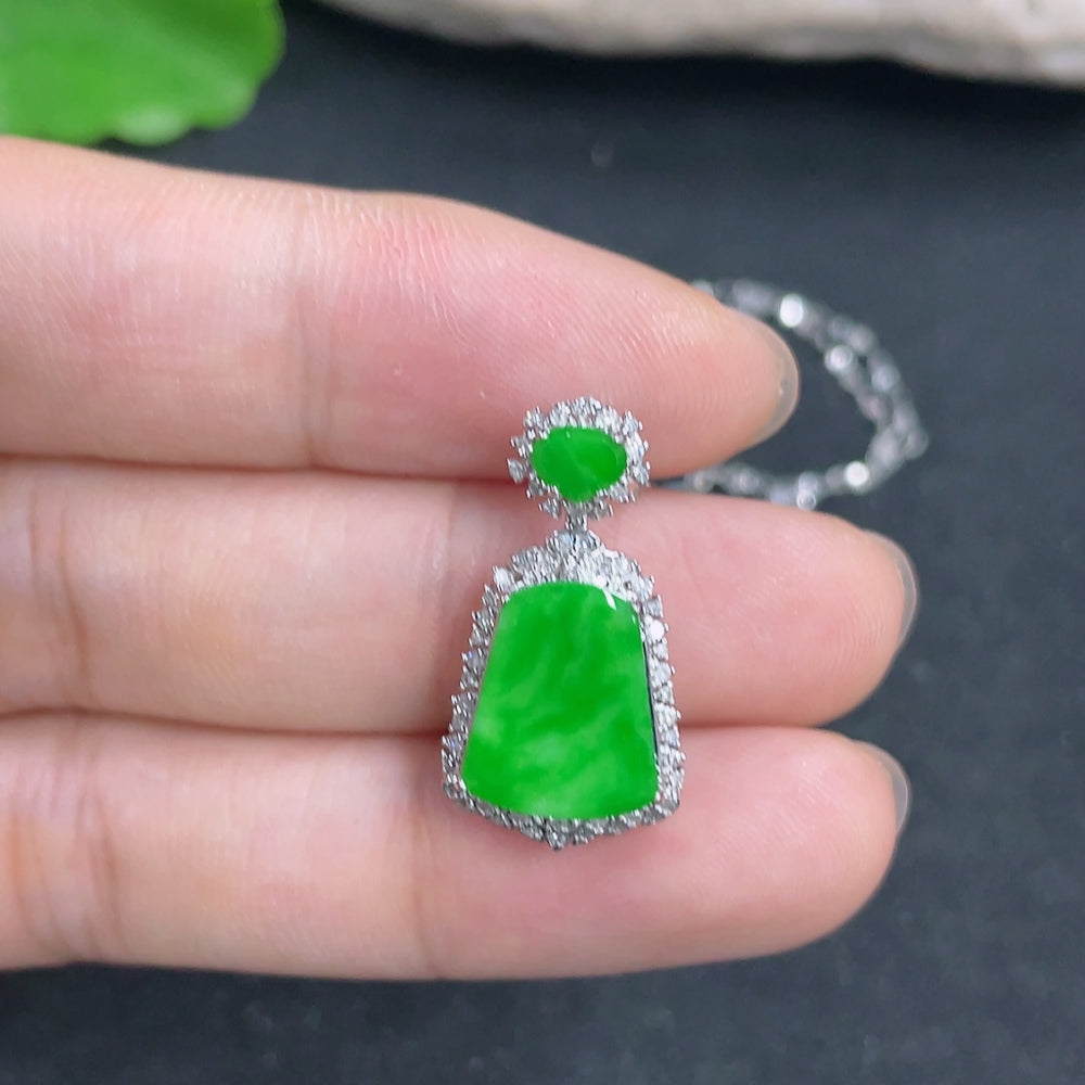 Jadeite pendant with 18K gold accents and diamond details, featuring a smooth, polished jade stone on a delicate chain.