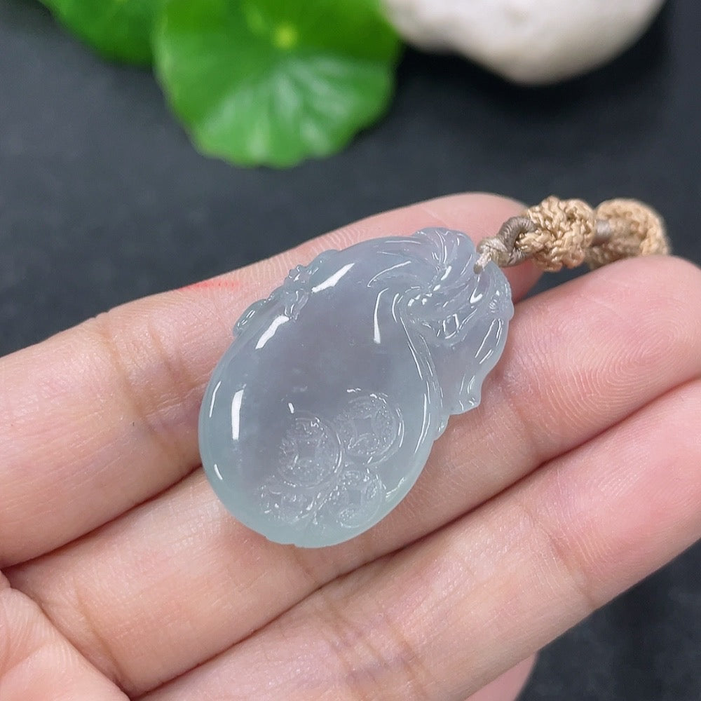 Jadeite pendant shaped like a money bag with a rope, weighing approximately 9g, featuring vibrant green jade from HKHQ.