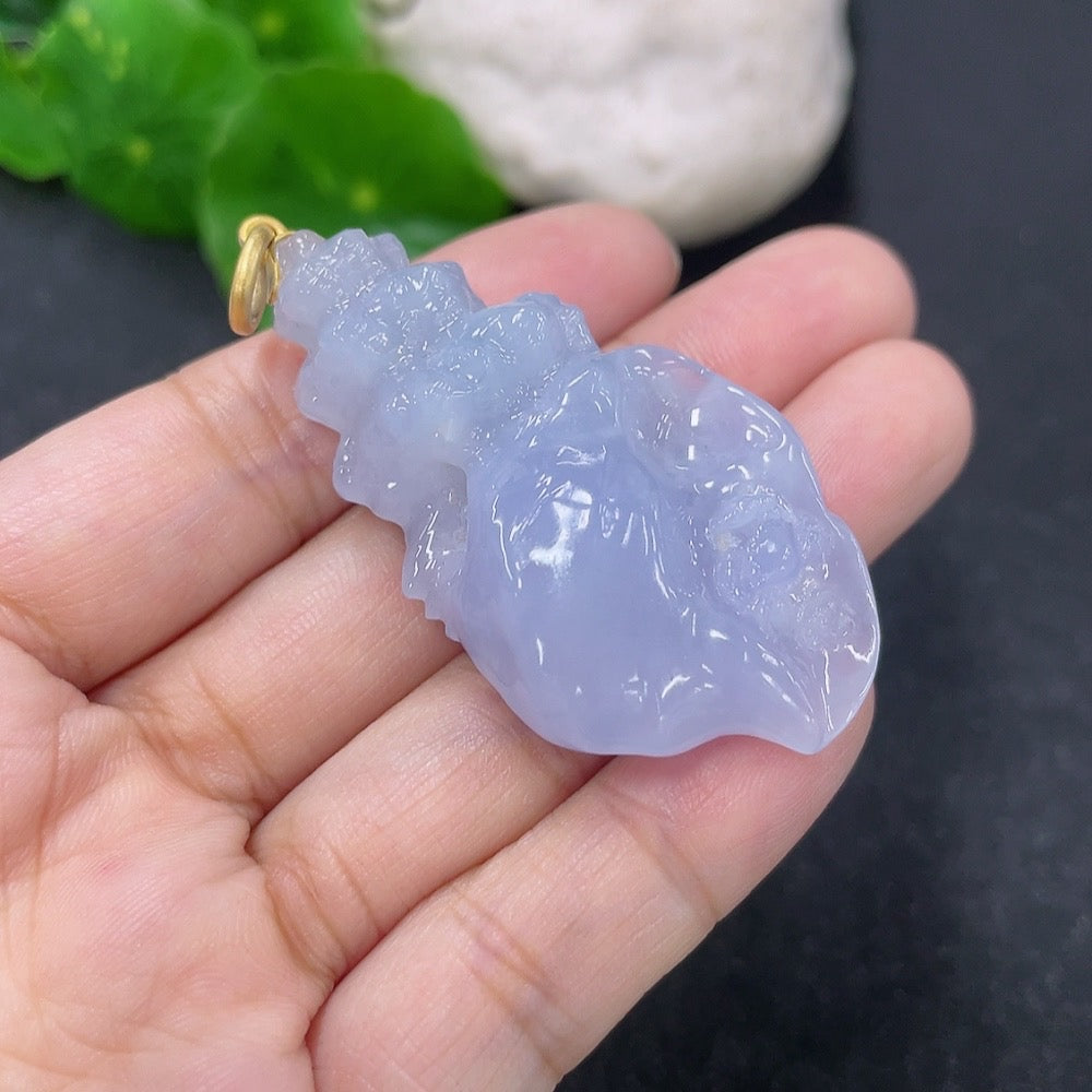 Jadeite inlaid pendant with 18k gold setting, HKHQ brand, showcasing intricate jade design and craftsmanship.