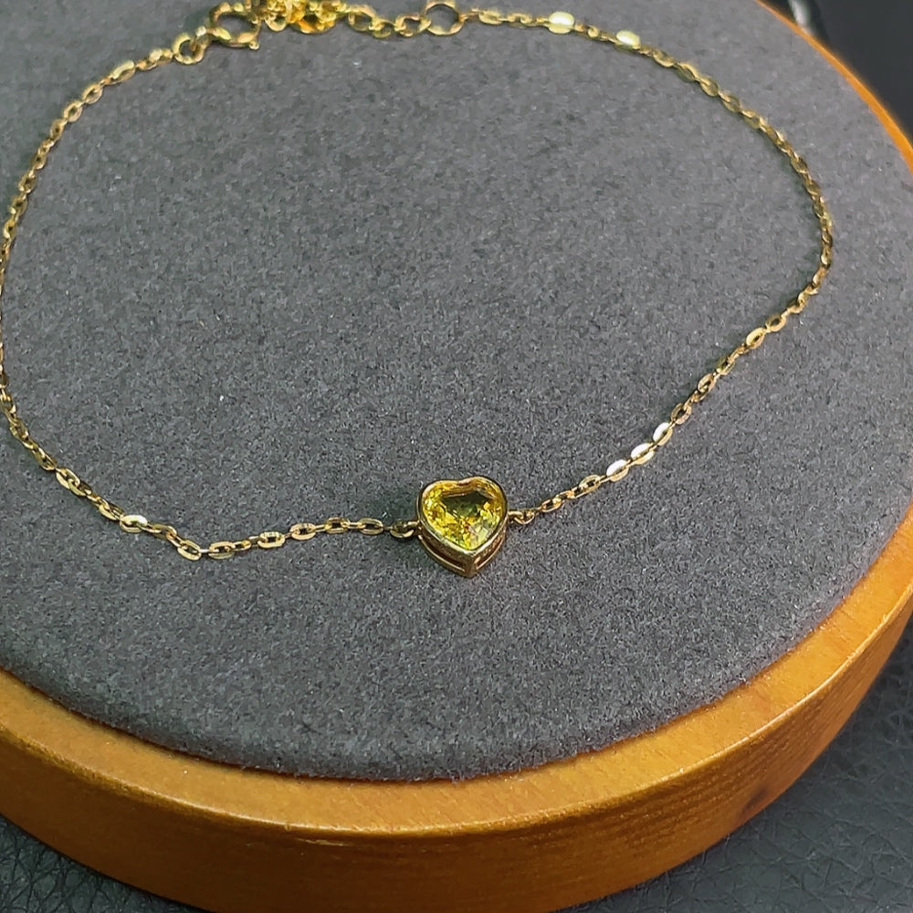 HKHQ sapphire inlaid bracelet with 18k gold, featuring a delicate gemstone design and a total weight of about 1.15g.