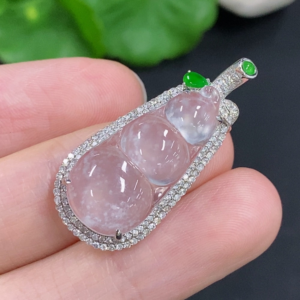 Jadeite lucky bean pendant with 18K gold and diamond accents, showcasing smooth green jade and intricate gold detailing.