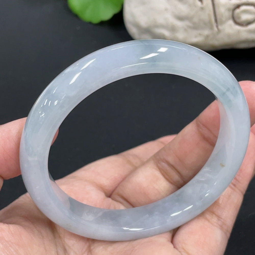 Jadeite round bracelet with a total weight of 50.6g and size 56.6, featuring smooth, polished jadeite beads.