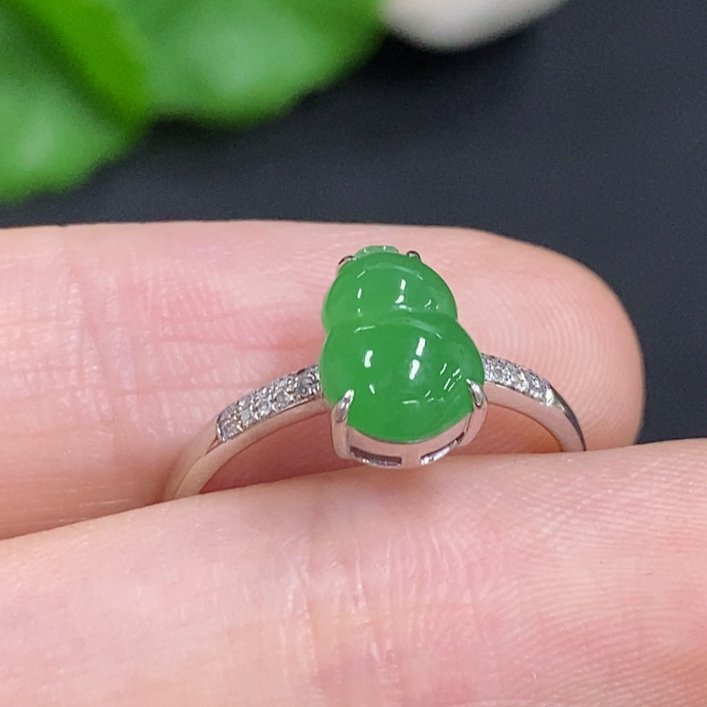 Jadeite gourd inlay ring with 18K gold band, diamond accents, size 13, weighing approximately 2 grams, by HKHQ.