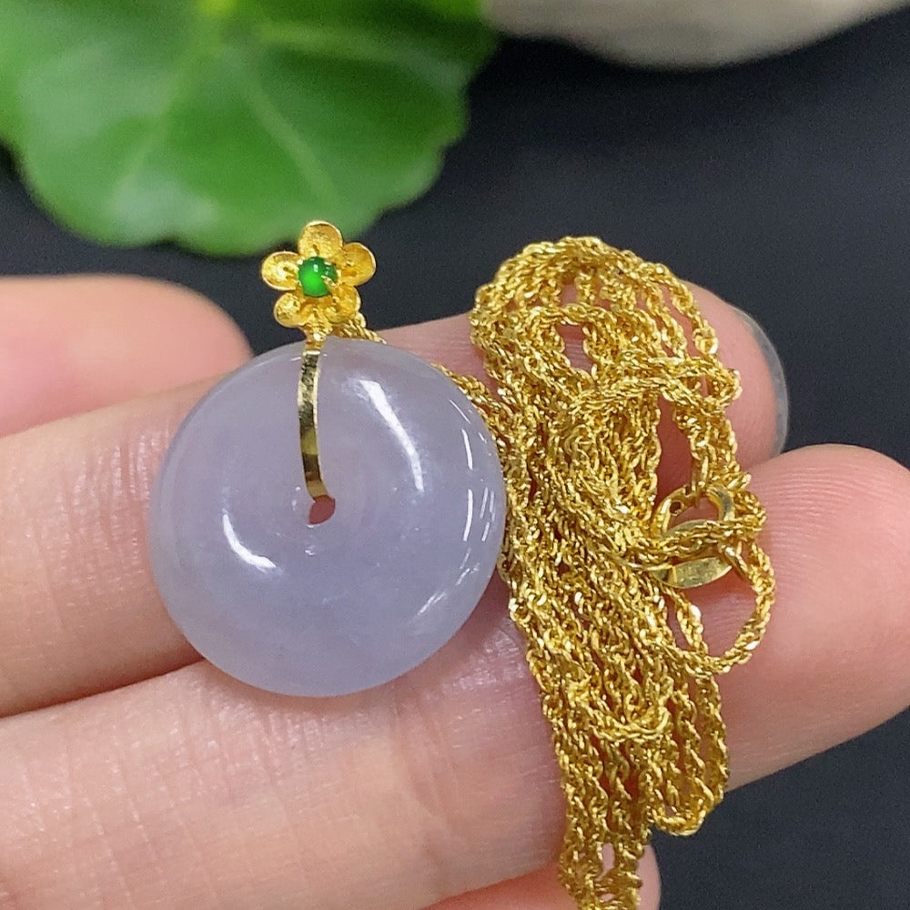 Jadeite safety buckle pendant with 18K gold chain, featuring a polished green jade pendant and delicate gold details.