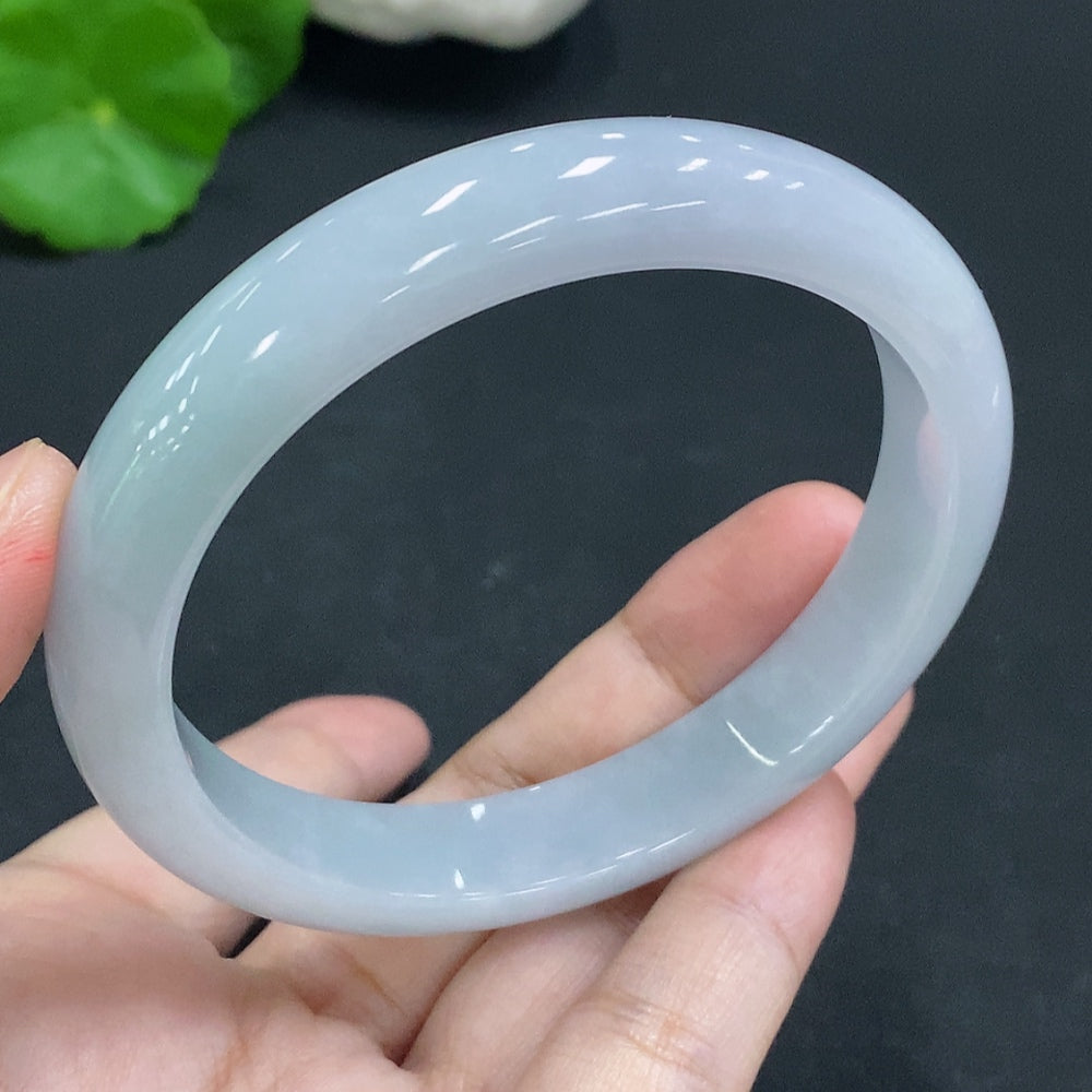 HKHQ Jadeite round bracelet, Huiliu certified, featuring smooth green jade beads on a stretchy cord.
