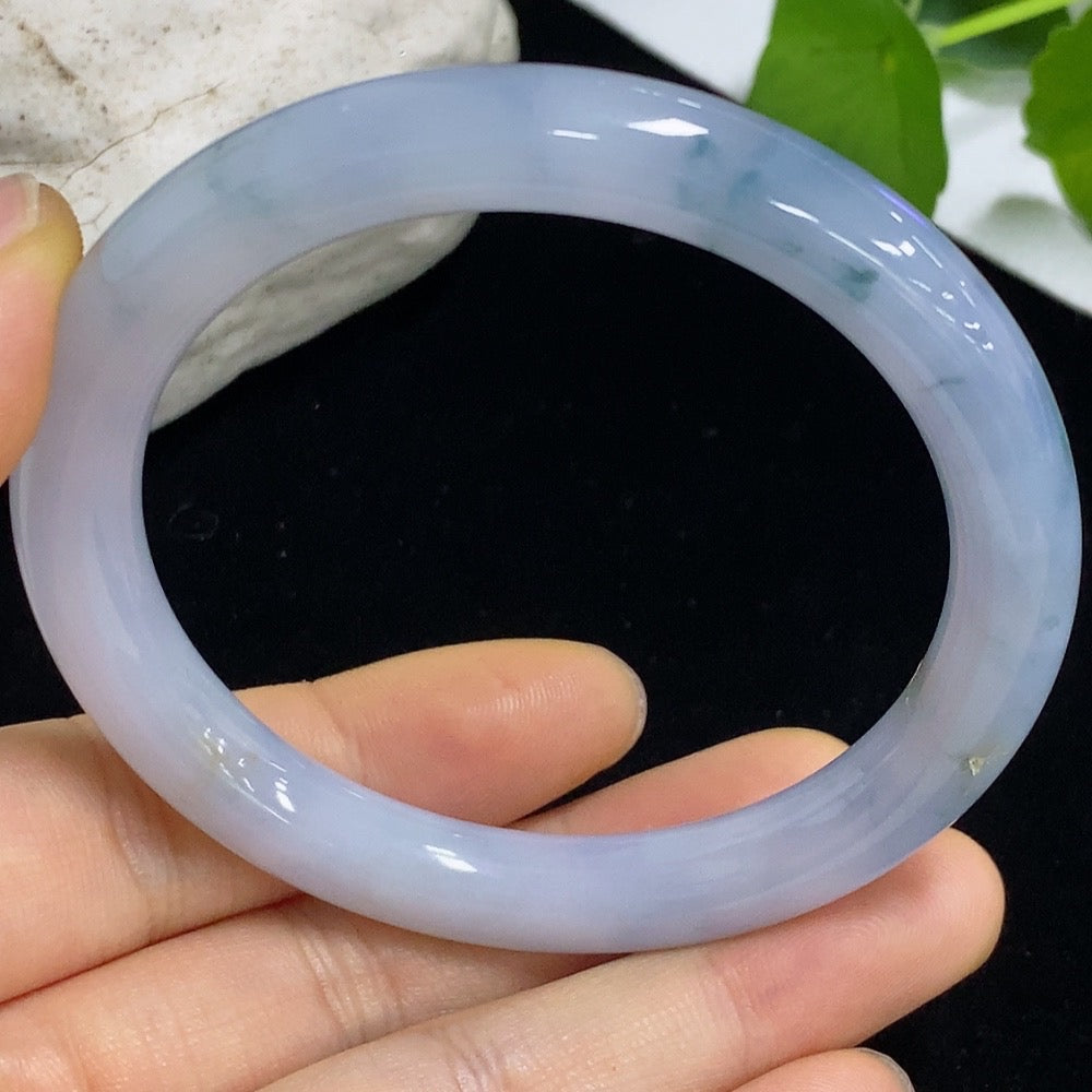 HKHQ jadeite round bangle, 40.06g, size 55.6, crafted from smooth green jade, showcasing polished and elegant jewelry design.