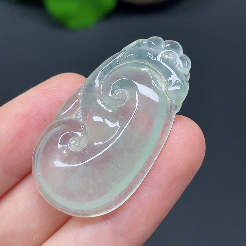 Jadeite Ruyi pendant with intricate carvings, weighing approximately 7.36g, crafted from high-quality jade by HKHQ.