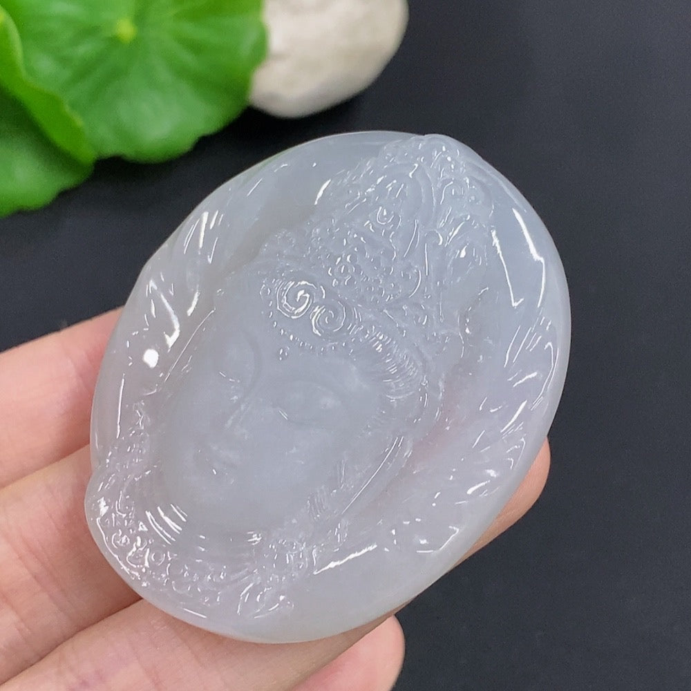 Jadeite Guanyin pendant necklace from HKHQ, featuring a detailed carved figure, weighs approximately 38g, on a delicate chain.