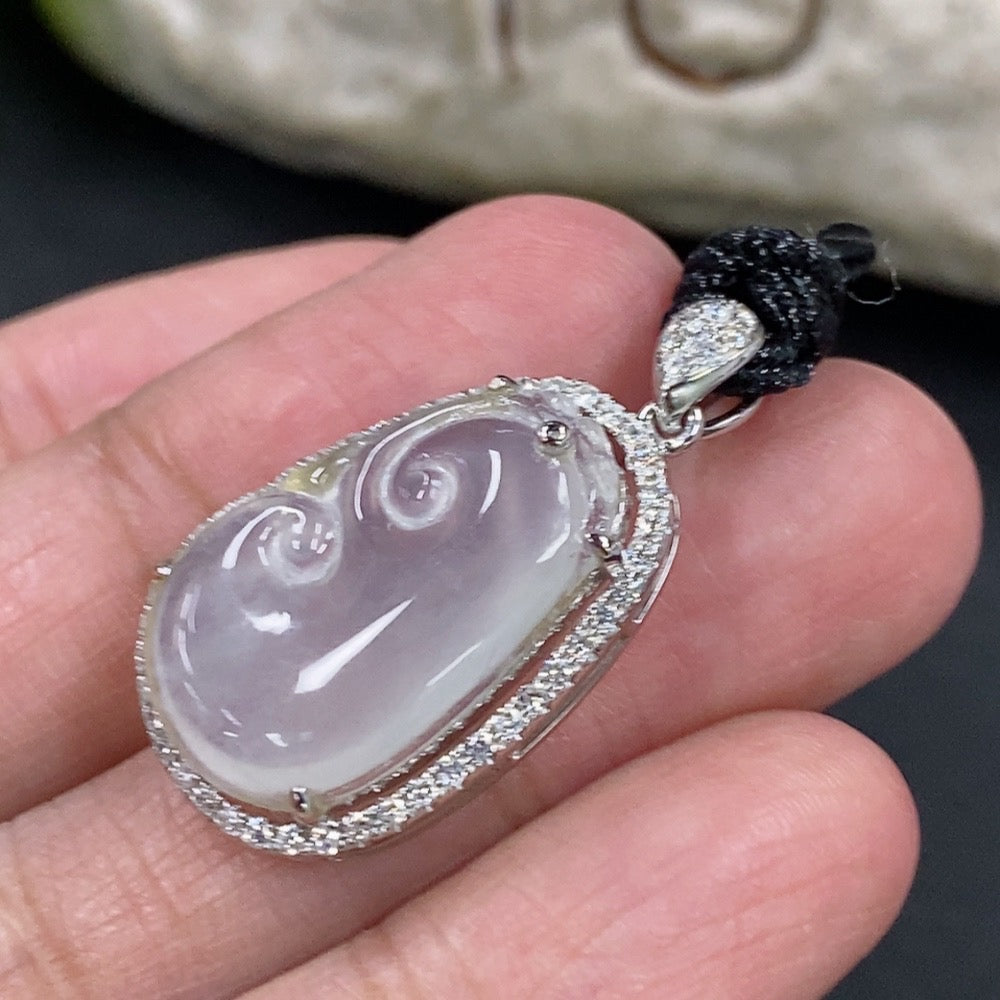 Jadeite inlaid Ruyi pendant with 18k gold and diamond accents, featuring a jade jade product with a rope, weighing about 5.26g.