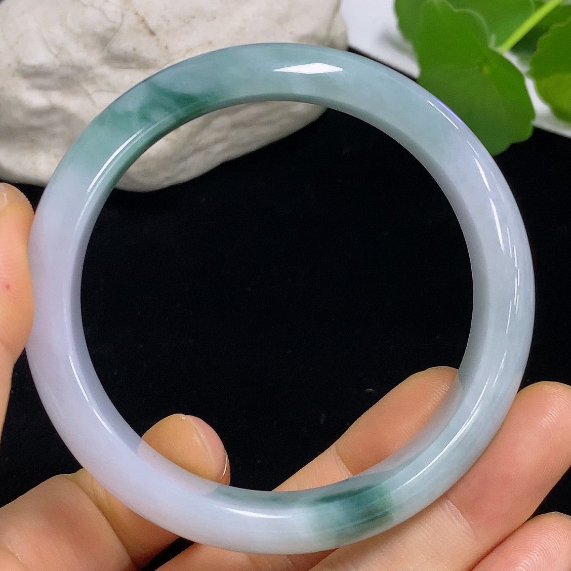 HKHQ jadeite round bangle, size 57.3, crafted from high-quality jade, weighs approximately 50.05g, smooth and polished surface.