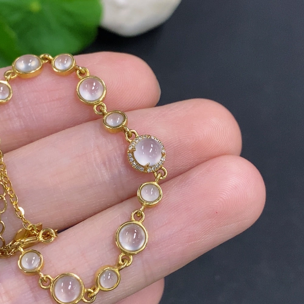 HKHQ jadeite cabochon inlay bracelet with 18k gold and diamond accents, showcasing elegant jewelry design.