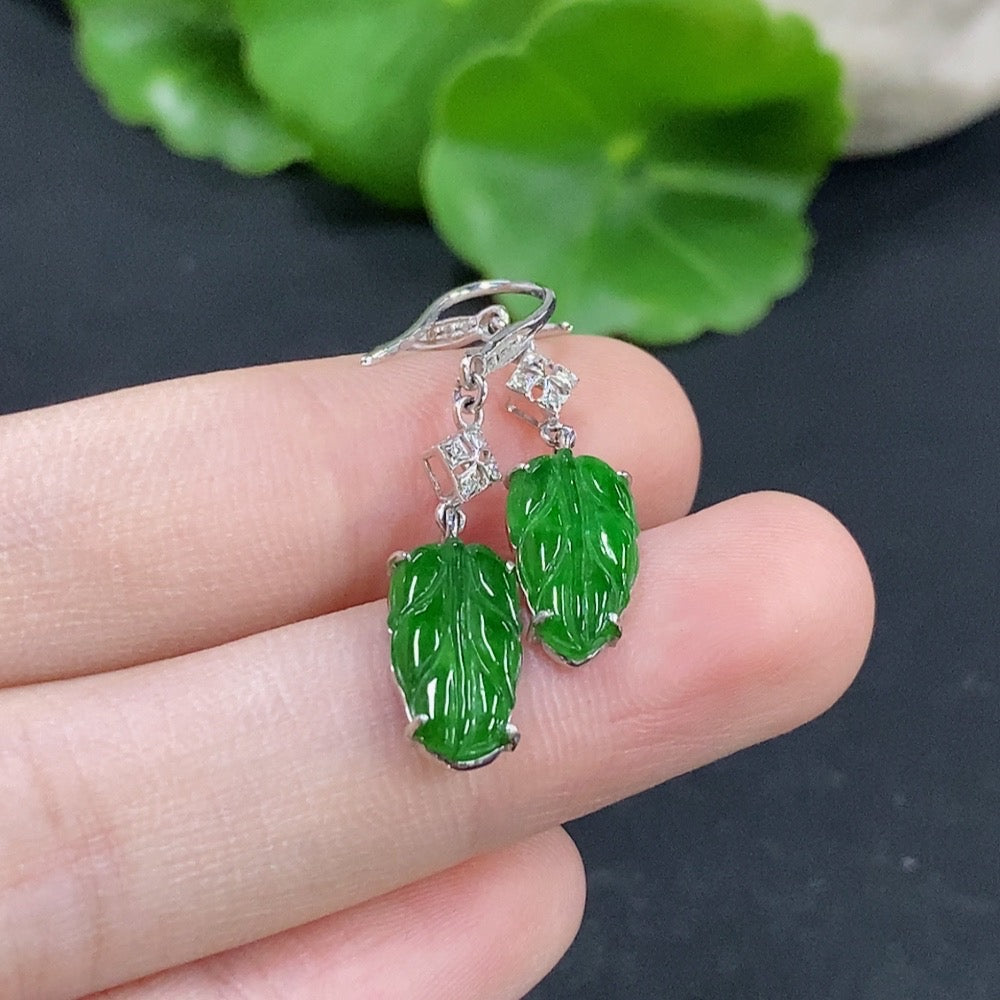 Jadeite leaf inlaid earrings with 18k gold and diamond accents, featuring detailed leaf design and delicate craftsmanship.