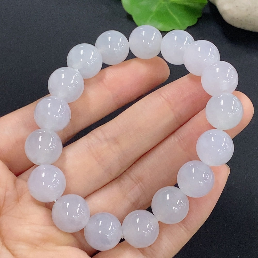 HKHQ jadeite bracelet featuring 11.5mm smooth jade stones, total weight approximately 43.88g, showcasing glossy green jade beads.
