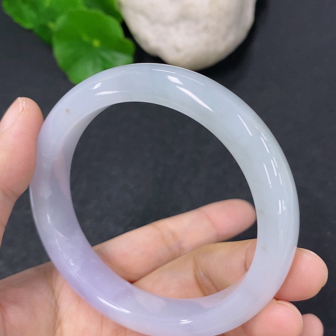 HKHQ jadeite round bangle bracelet, 53.8mm size, smooth green jadeite with a polished finish, weighs approximately 49.63g.