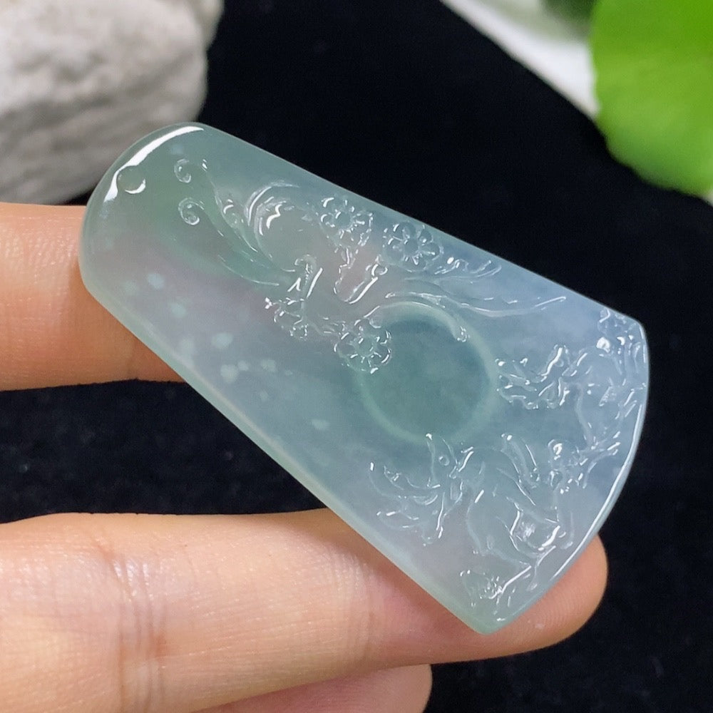 Jadeite deer pendant from HKHQ, carved green jade jewelry with detailed deer design, weighs approximately 14.62 grams.