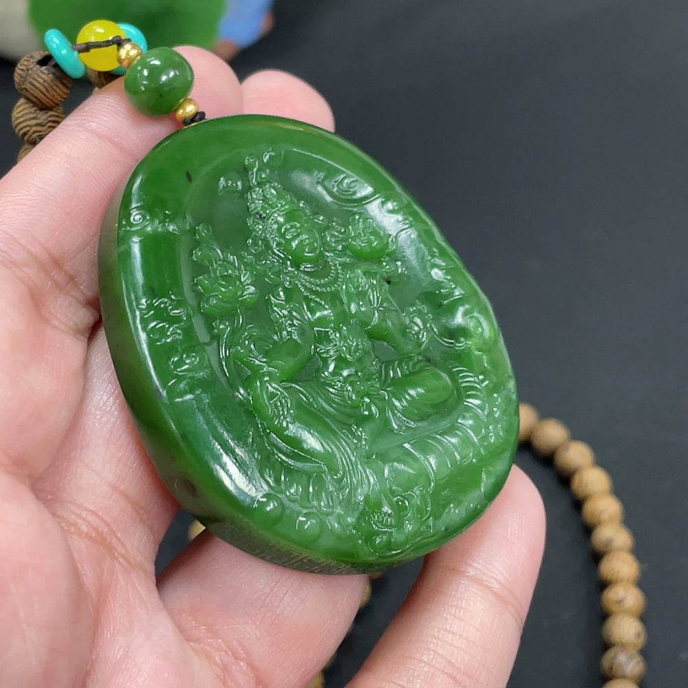 Hetian Jade Jasper pendant featuring Mahasthamaprapta Bodhisattva, crafted from green jade with intricate carved details.