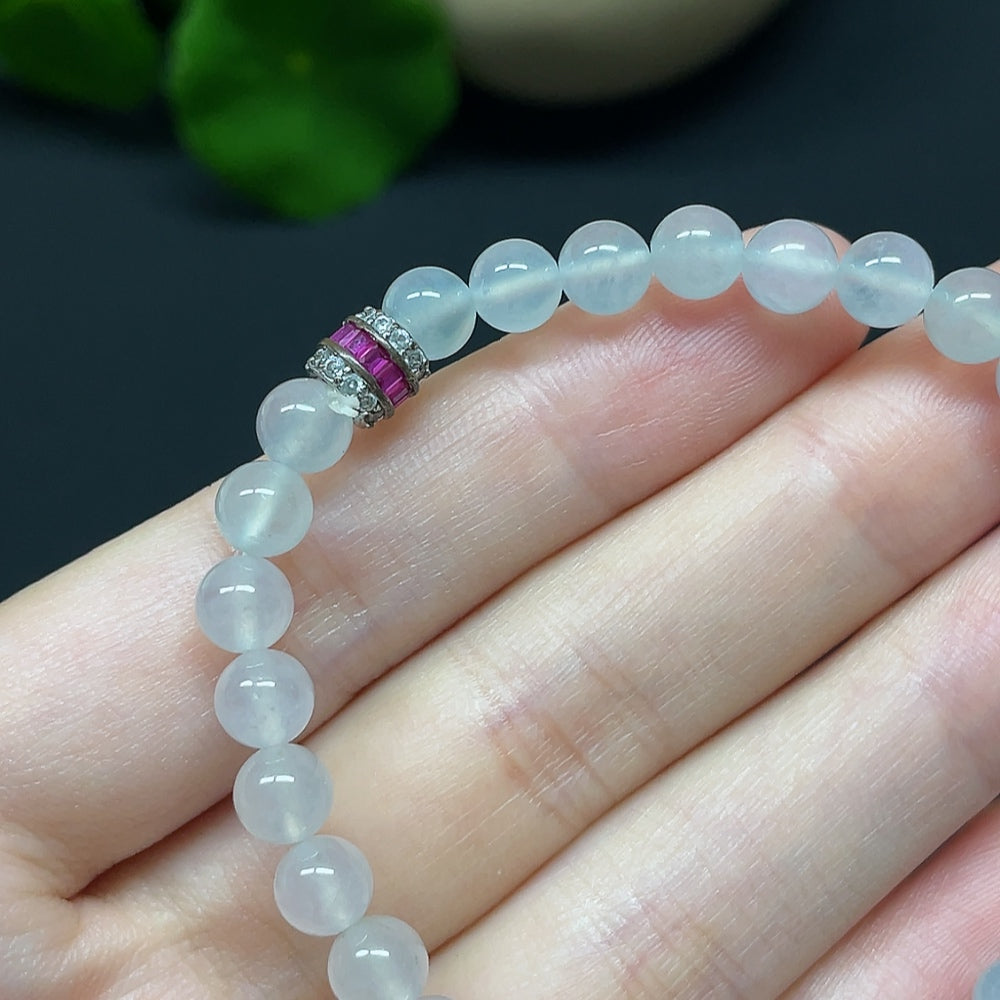 HKHQ jadeite bracelet with non-gold beads, total weight 10.66g and bead size 5.8mm, featuring smooth, polished jade beads.