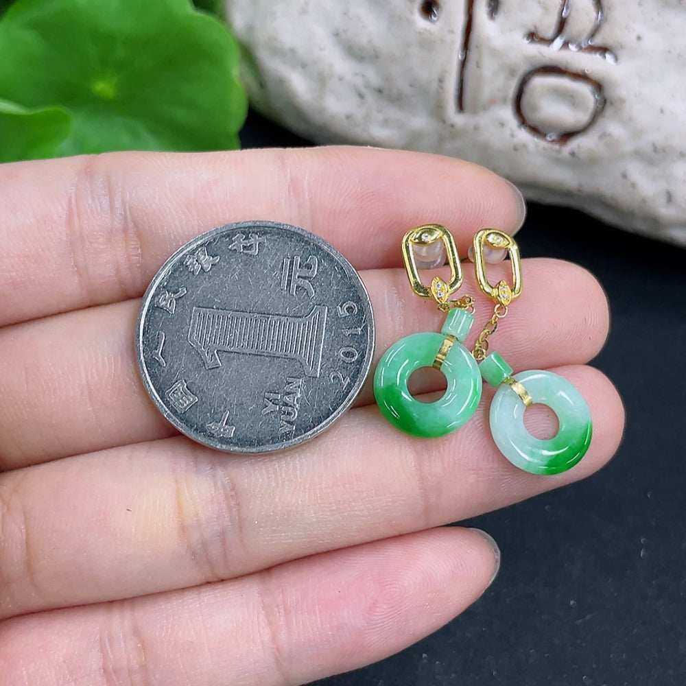 Elegant jadeite earrings with 18k gold setting, lightweight and non-diamond, showcased in a close-up image.