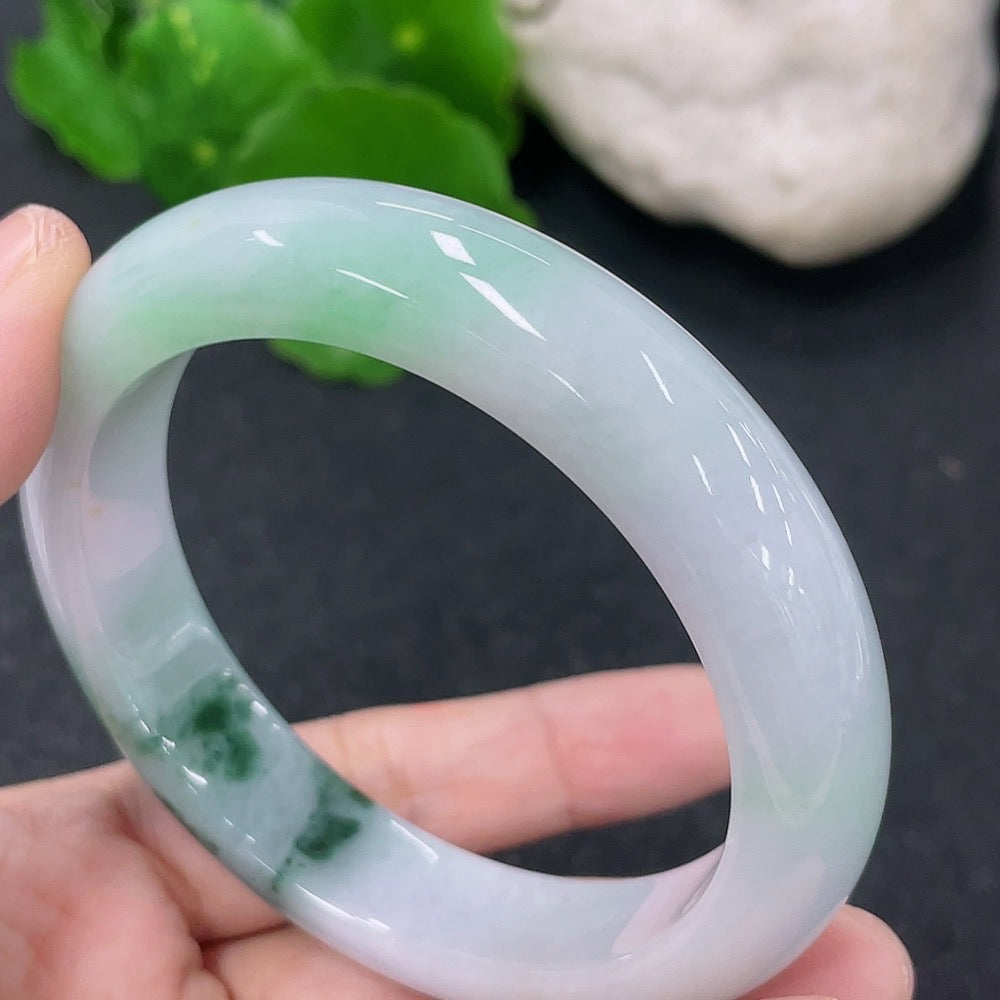 HKHQ jadeite round bangle, 54.5mm size with a total weight of 57.8g, showcasing smooth, polished jadeite surface and elegant design.