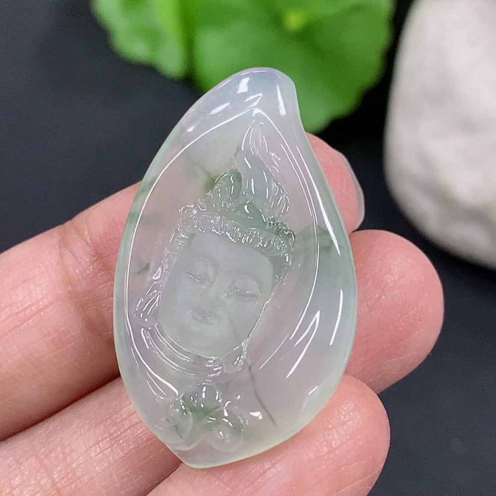 Jadeite Buddha pendant from HKHQ, featuring a detailed carved Buddha figure on smooth green jade, weighing approximately 6.1 grams.