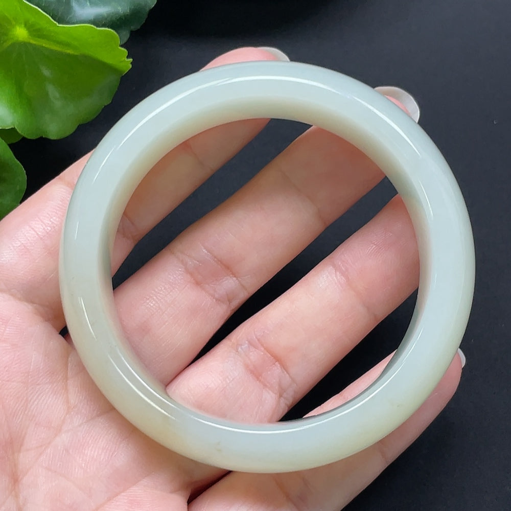 HKHQ Hetian Jade round bracelet, 52mm diameter, weighing approx. 60.95g, showcasing smooth, polished jade beads.