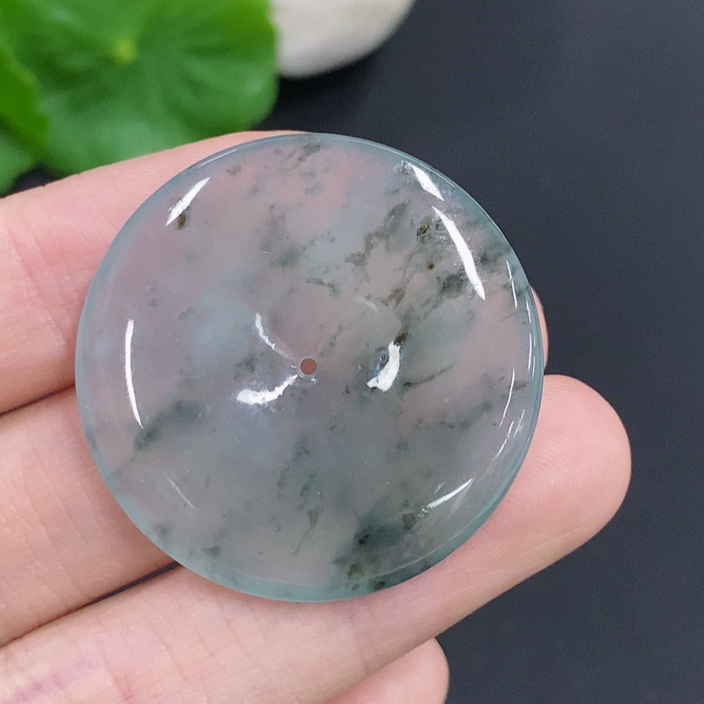 Jadeite Peace Knot jewelry piece, approximately 10.7g, featuring a polished jadeite knot design in a close-up view.