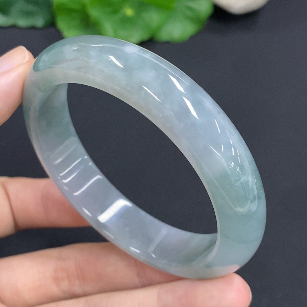 Jadeite round bracelet by HKHQ featuring smooth green jade beads, total weight approximately 56.4g, size 56.
