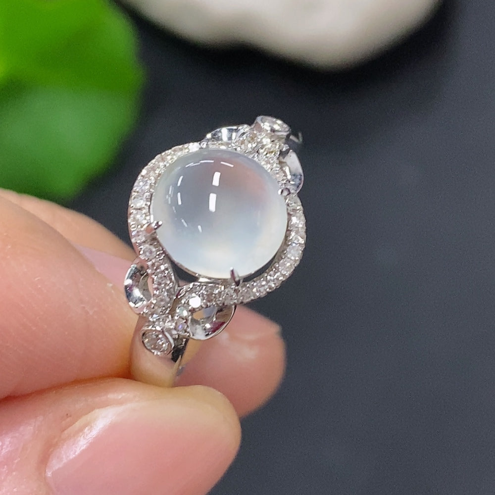 Jadeite cabochon ring with diamond accents in 18K gold, size 12, from HKHQ, featuring a polished jade gemstone and gold band.