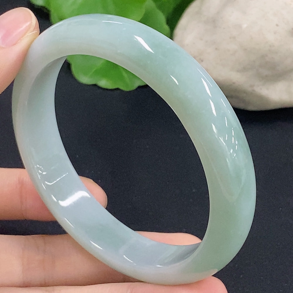 HKHQ jadeite round bangle, size 58.9 with about 56.8g weight, showcasing smooth, polished jadeite bracelet with natural color variations.