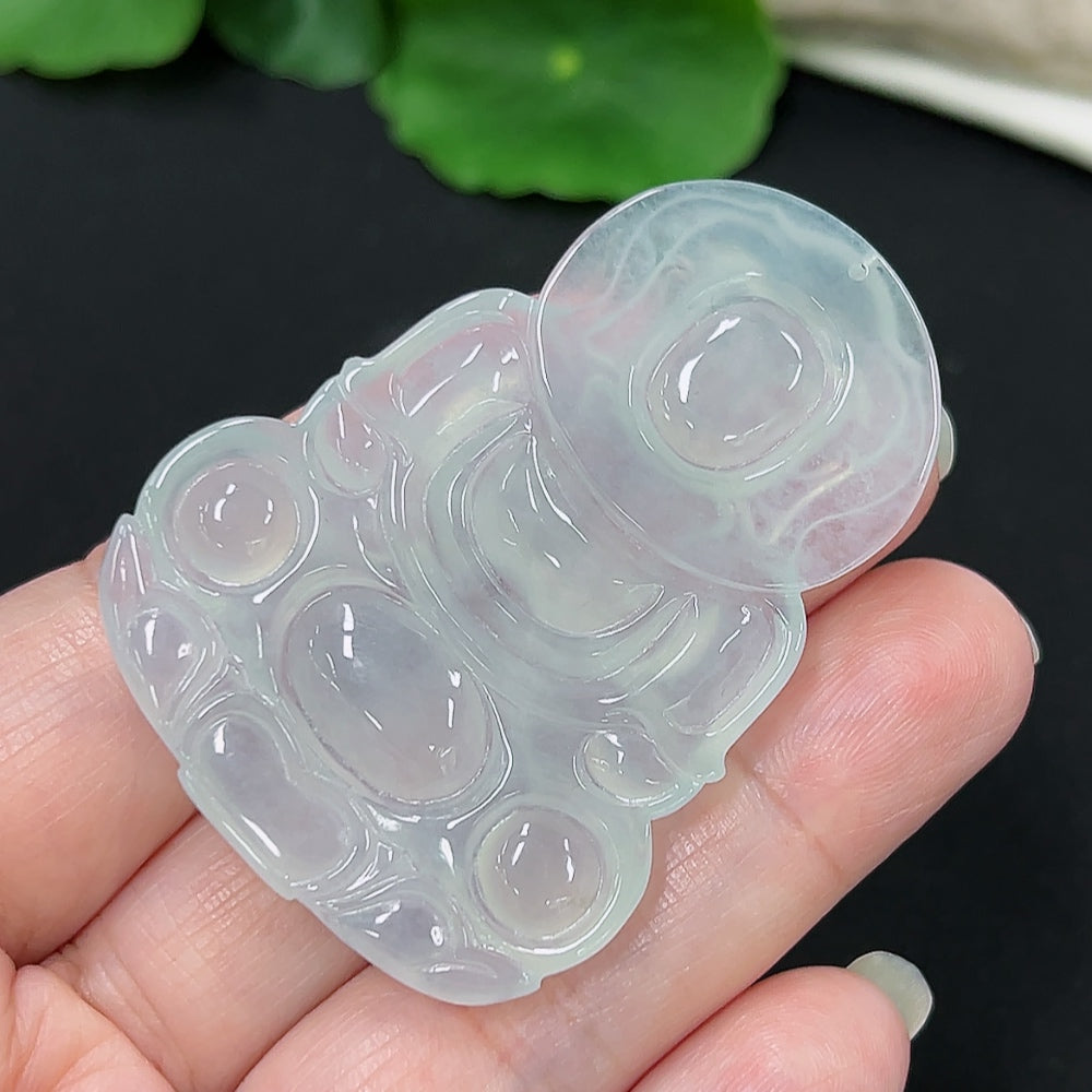 Jadeite Guanyin pendant in jade, approximately 21.1g, showcasing detailed craftsmanship and smooth polished surface.