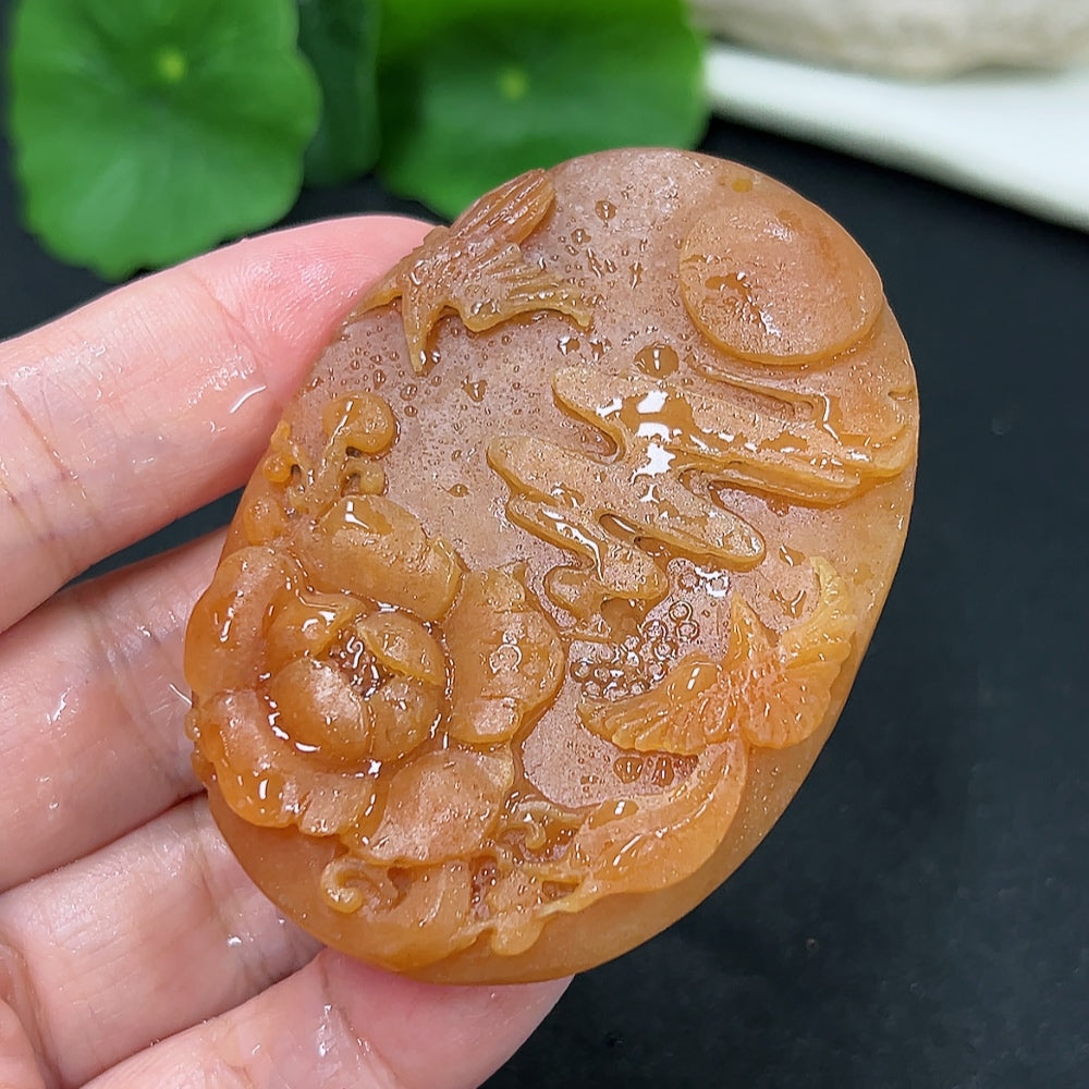 Unpolished jadeite pendant featuring blossoming wealth and prosperity design, weighing approximately 48.1g, from HKHQ.