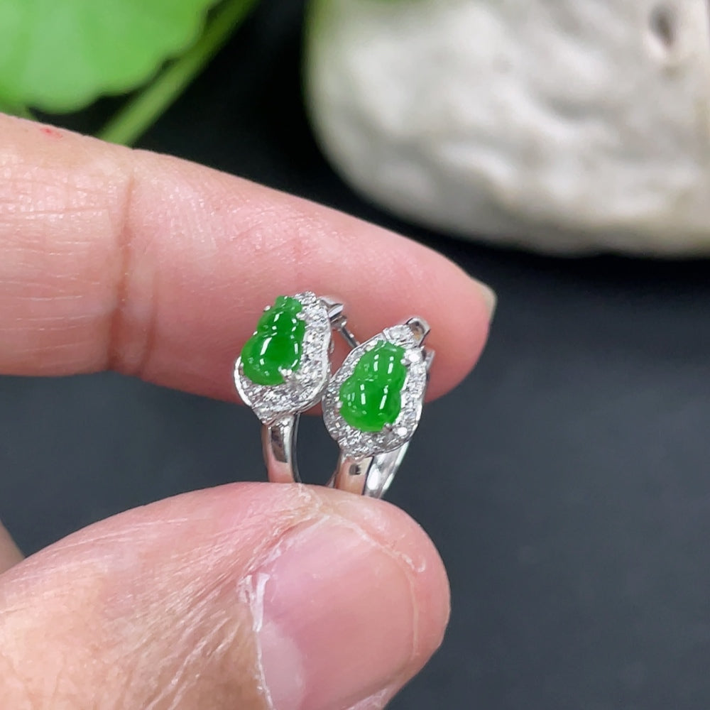 Jadeite gourd inlaid diamond earrings in 18k gold with HKHQ branding, delicate and elegant ear studs.
