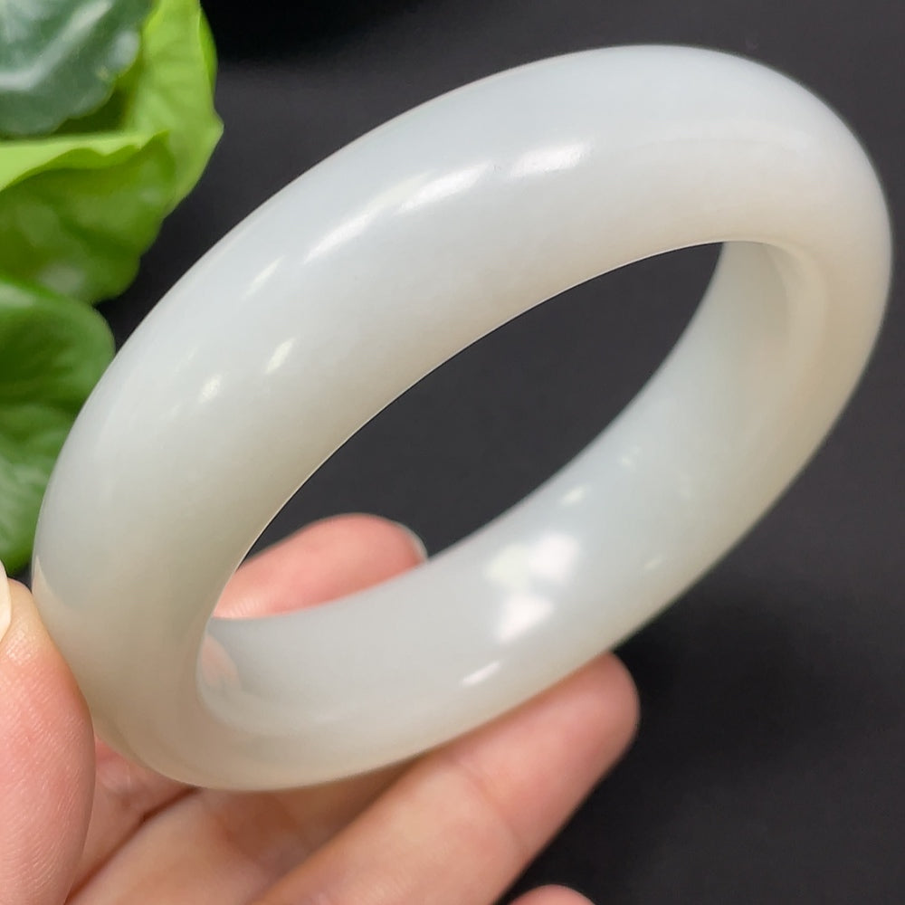 HKHQ Hetian Jade round bangle, size 60.8, weighing 104.26g, showcasing smooth polished jade bracelet with natural green hues.