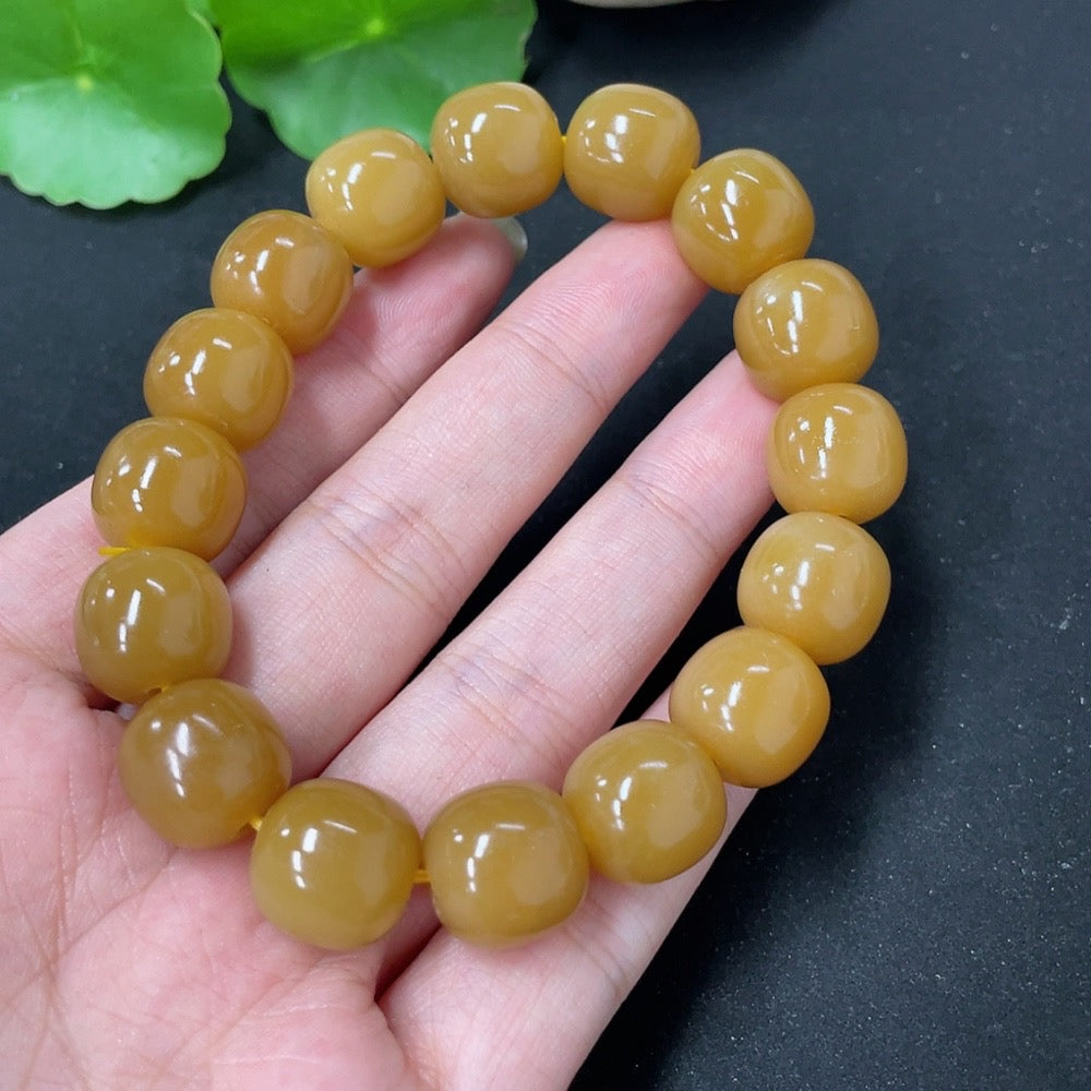Hetian Jade bracelet by HKHQ featuring smooth, polished jade beads with a 58.5g weight, showcasing elegant craftsmanship.