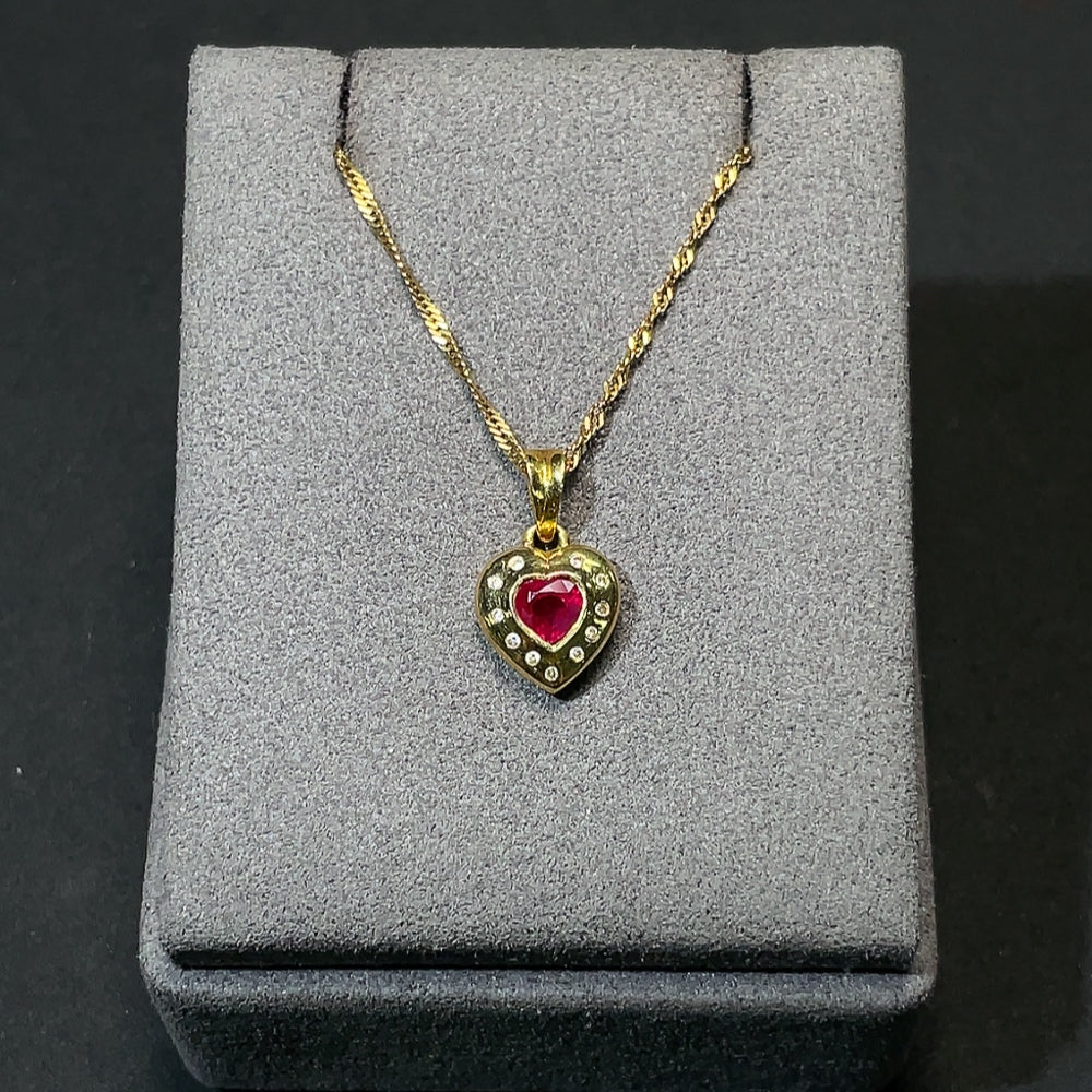 18K gold ruby pendant with diamond accents, total weight including chain approximately 4.14g