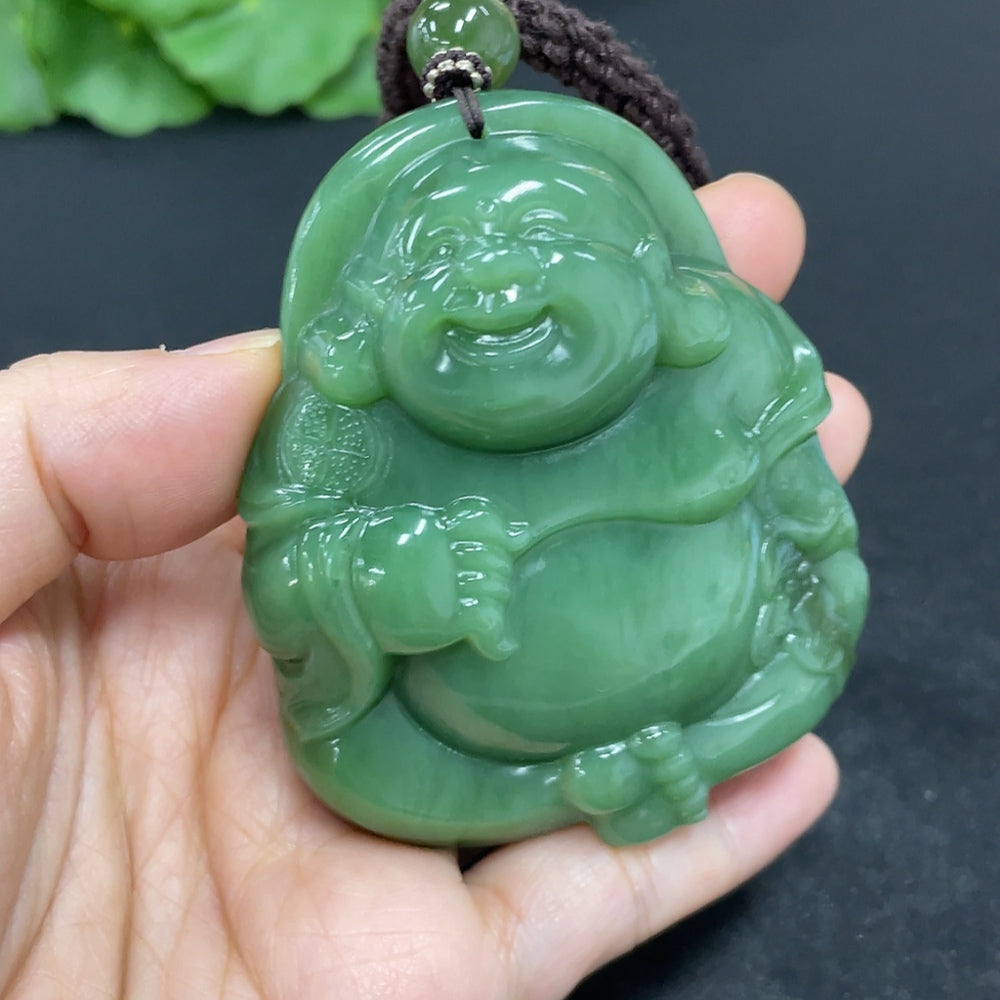 Hetian Jade Buddha pendant necklace with rope, weighing 141.1g, featuring detailed jade craftsmanship and natural stone texture.